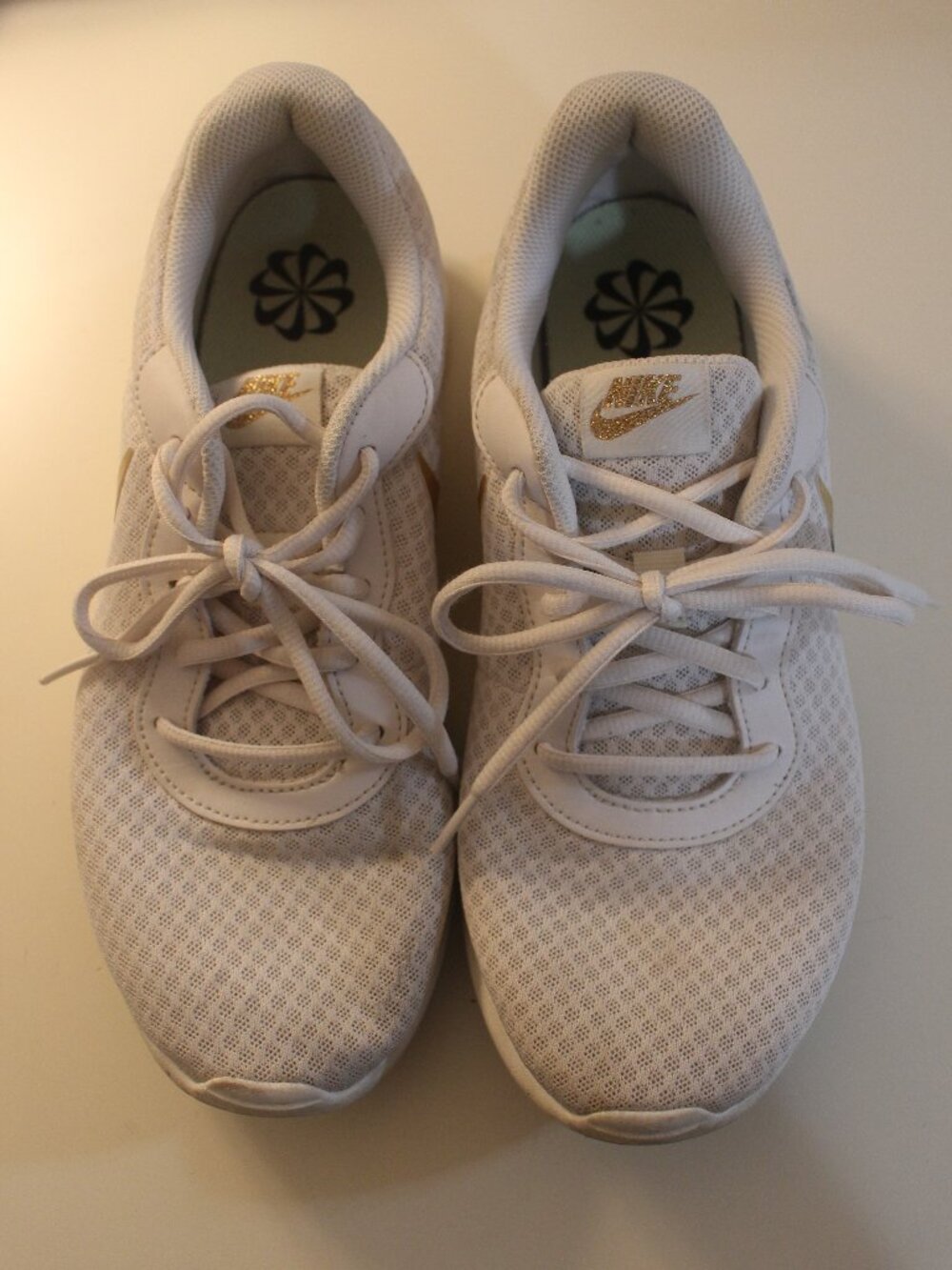 Nike White Mesh Sneakers with Metallic Gold Swoosh